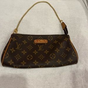 Authentic Louis Vuitton *vintage* hang bag.